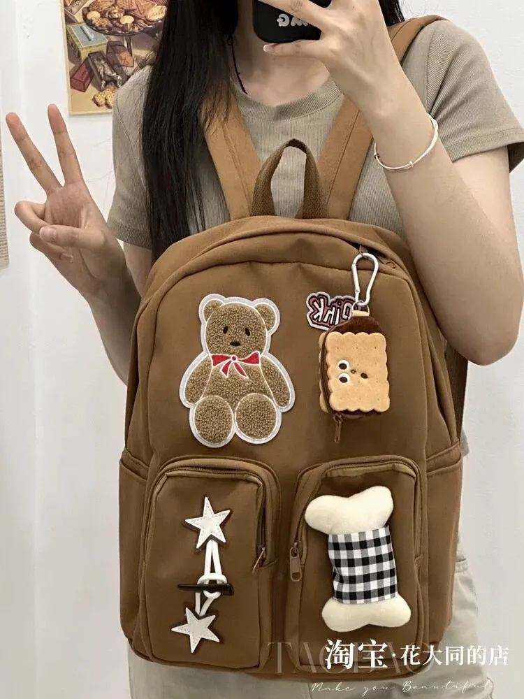 Japanese retro ins cute star bone bear schoolbag high school junior high school student large capacity canvas backpack for women