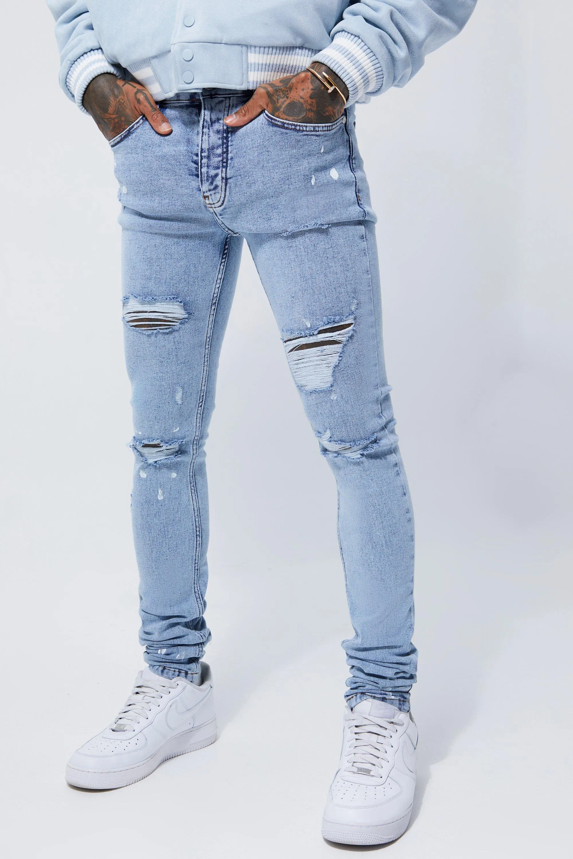 Super Skinny Stacked Ripped Paint Splatter Jeans